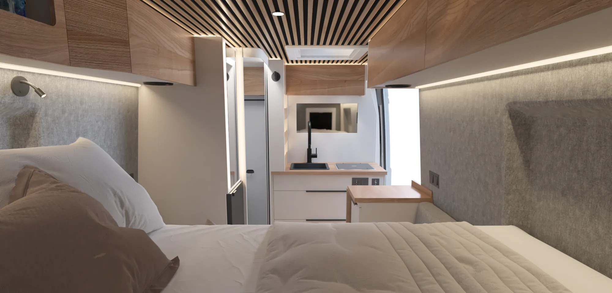 Interior de la Neo con mobiliario blanco y encimeras efecto madera