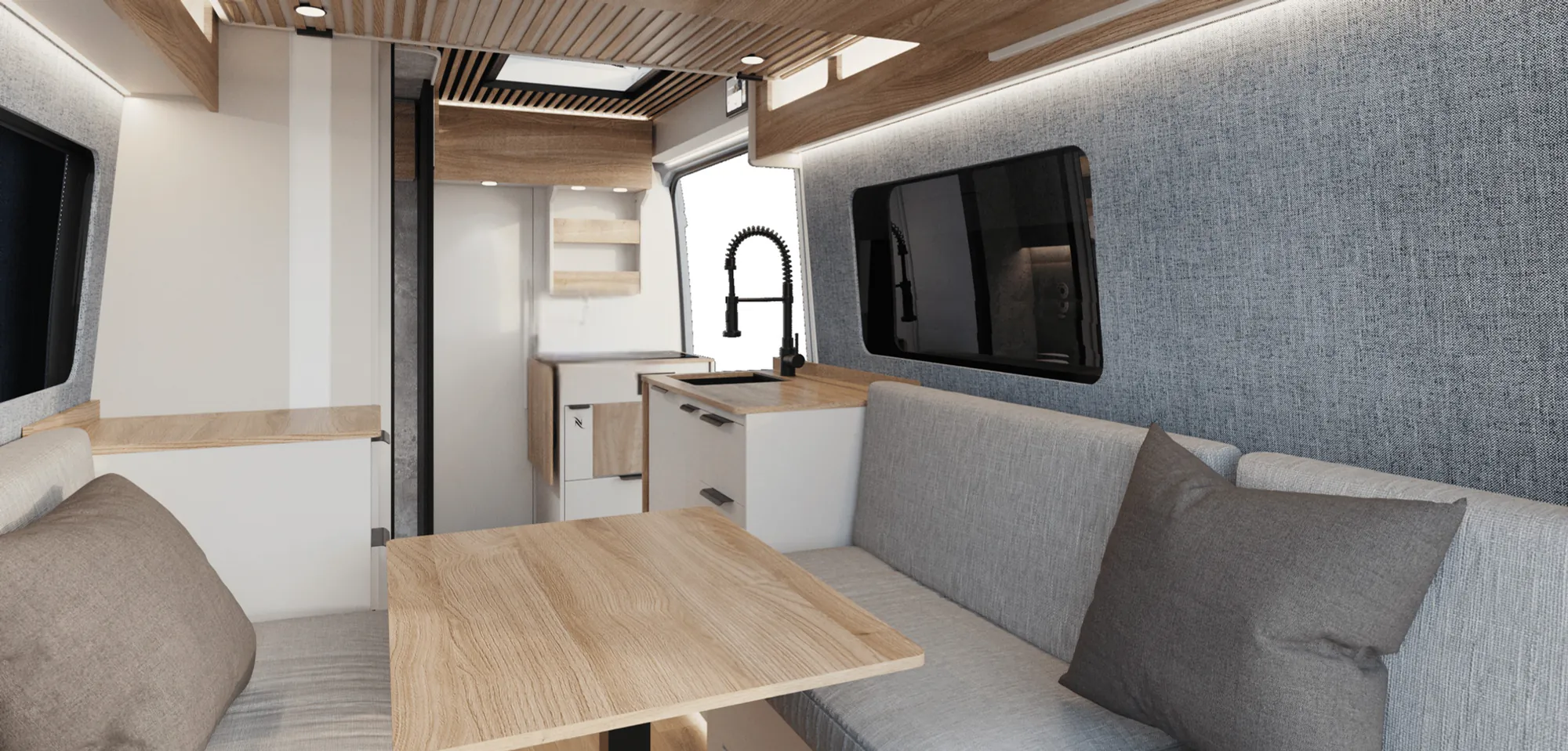 Interior de la Space S con mobiliario blanco y encimeras efecto madera