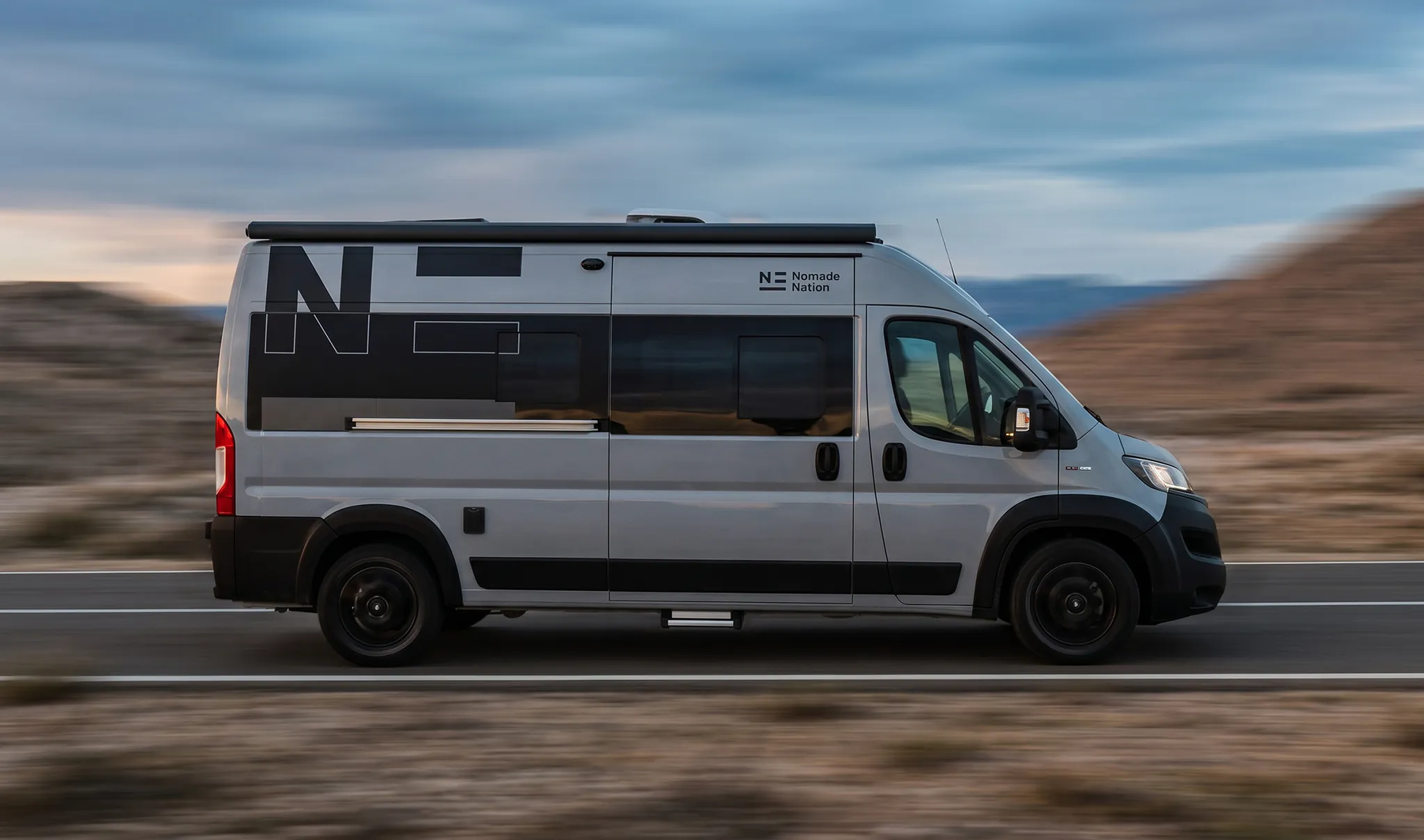 Camper Space driving on a mountain road